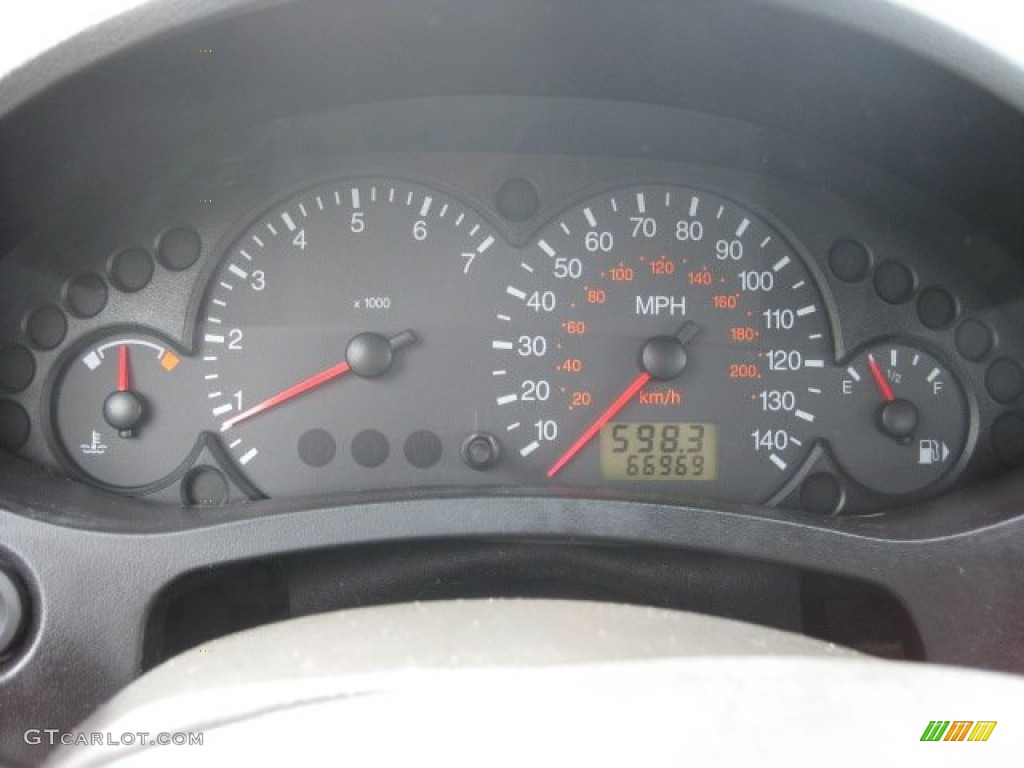 2006 Focus ZX4 SES Sedan - Light Tundra Metallic / Dark Flint/Light Flint photo #24