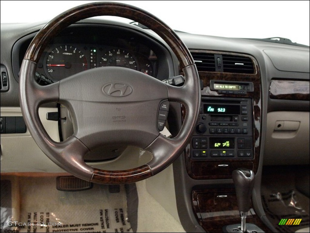 2002 XG350 Sedan - Ivory White Pearl / Beige photo #10