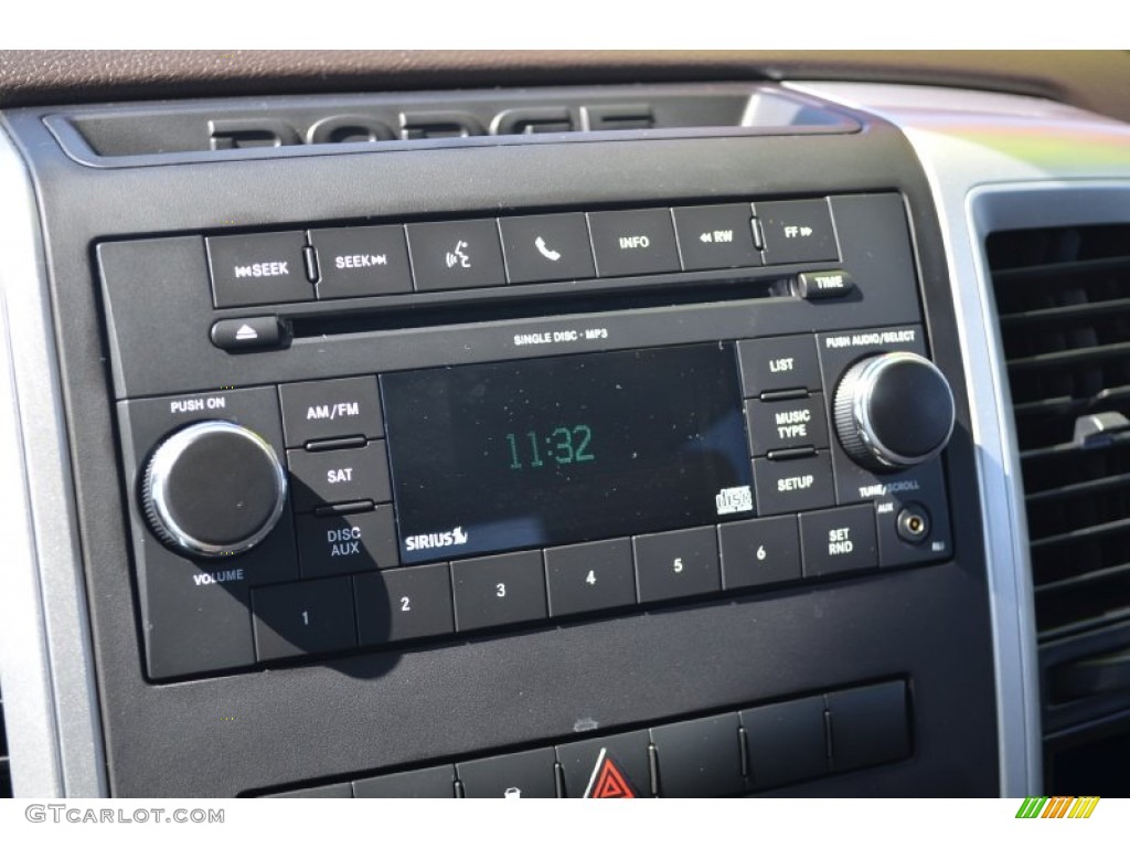 2010 Ram 1500 SLT Quad Cab 4x4 - Austin Tan Pearl / Light Pebble Beige/Bark Brown photo #24