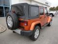 2011 Mango Tango Pearl Jeep Wrangler Unlimited Sahara 4x4  photo #8