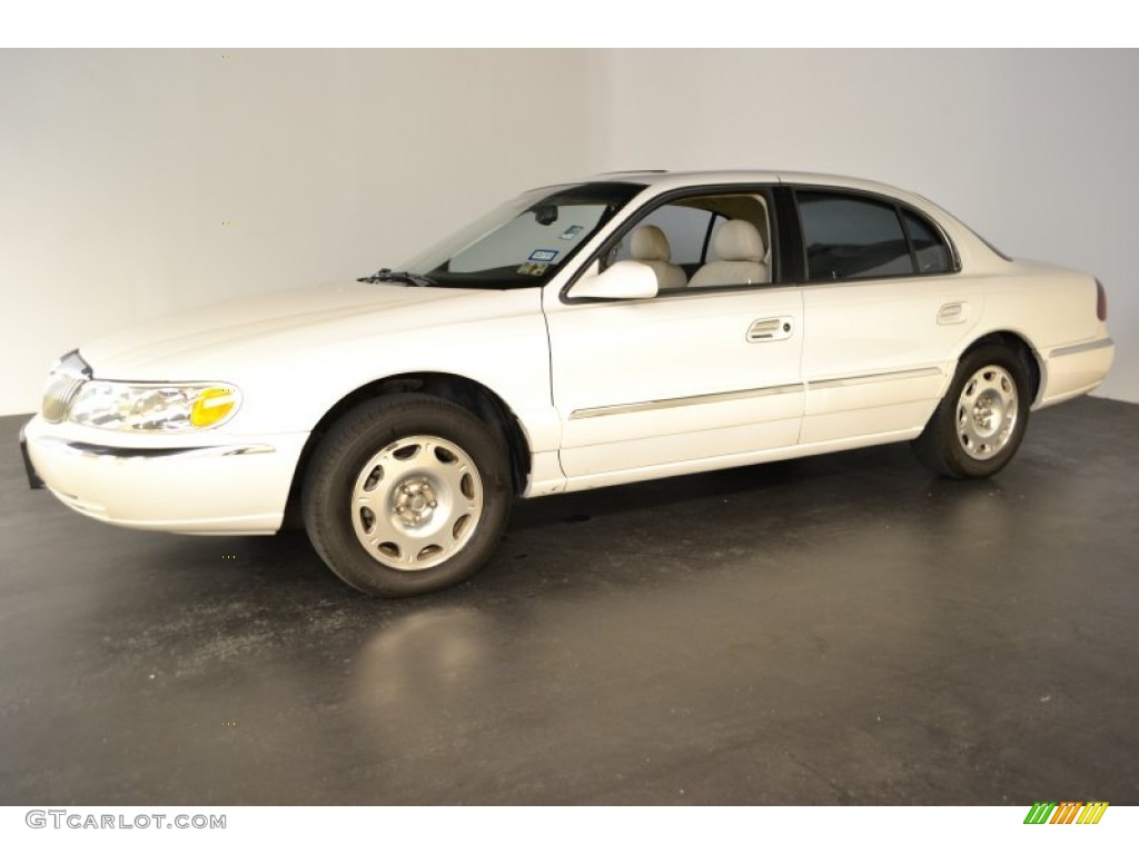 White Pearescent Tri-Coat 2002 Lincoln Continental Standard Continental Model Exterior Photo #55209072