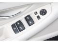 Oyster/Black Controls Photo for 2012 BMW 5 Series #55230274