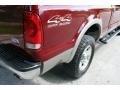 2005 Dark Toreador Red Metallic Ford F250 Super Duty Lariat Crew Cab 4x4  photo #24