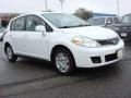 2010 Fresh Powder White Nissan Versa 1.8 S Hatchback  photo #1