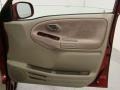 2004 Suzuki XL7 Beige Interior Door Panel Photo