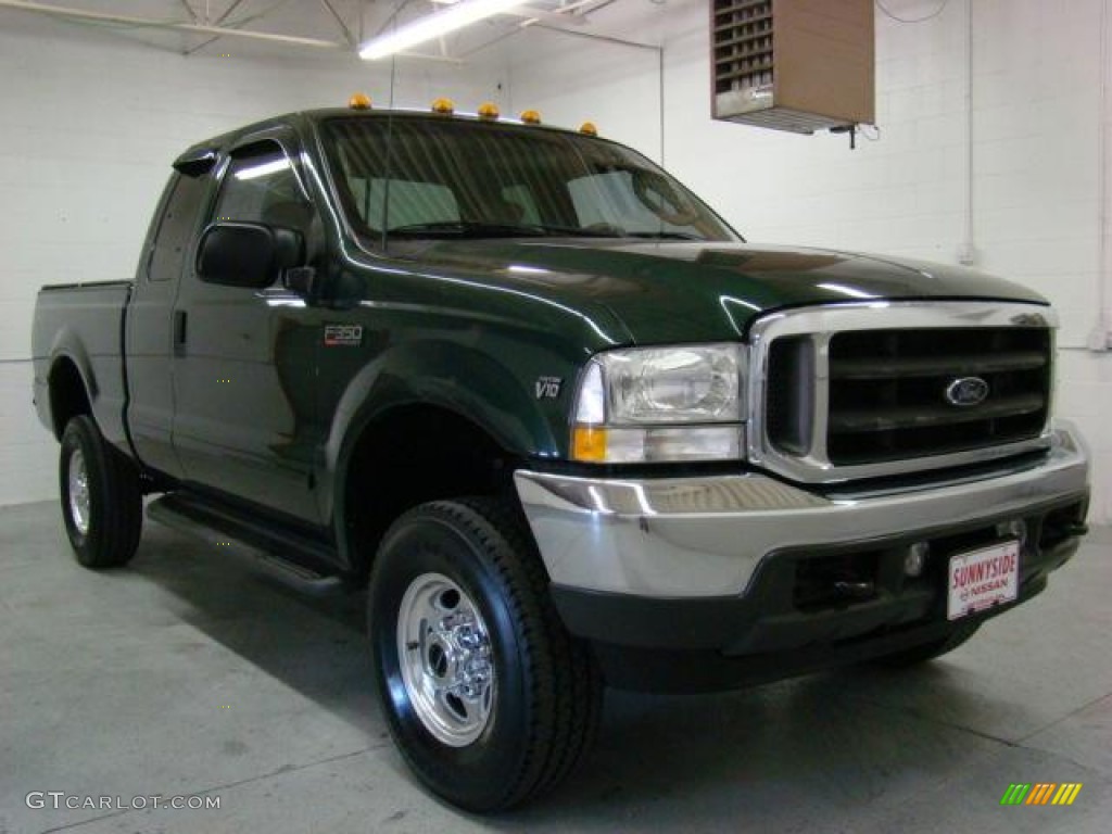 2003 F350 Super Duty Lariat SuperCab 4x4 - Dark Highland Green Metallic / Medium Parchment photo #1