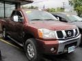 Sedona Red - Titan LE King Cab 4x4 Photo No. 1