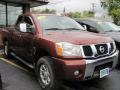 2004 Sedona Red Nissan Titan LE King Cab 4x4  photo #1