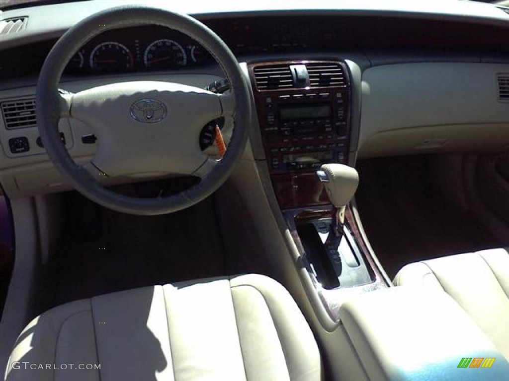 2002 Avalon XLS - Vintage Red Pearl / Taupe photo #5