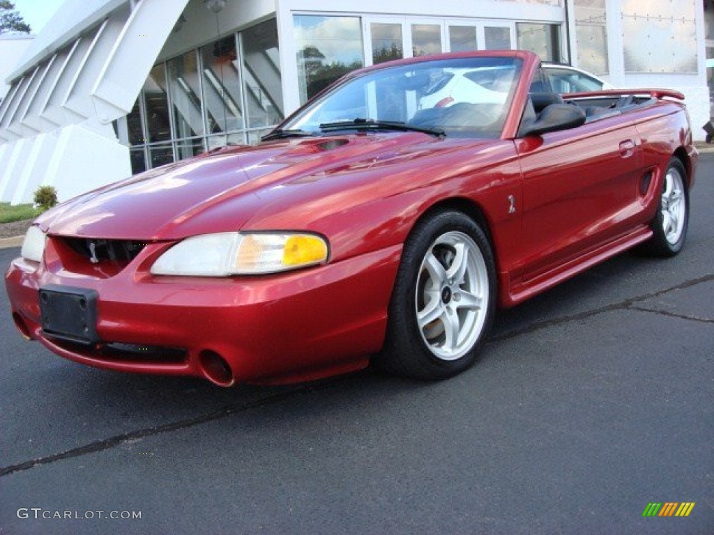 Laser Red 1998 Ford Mustang SVT Cobra Convertible Exterior Photo #55338558
