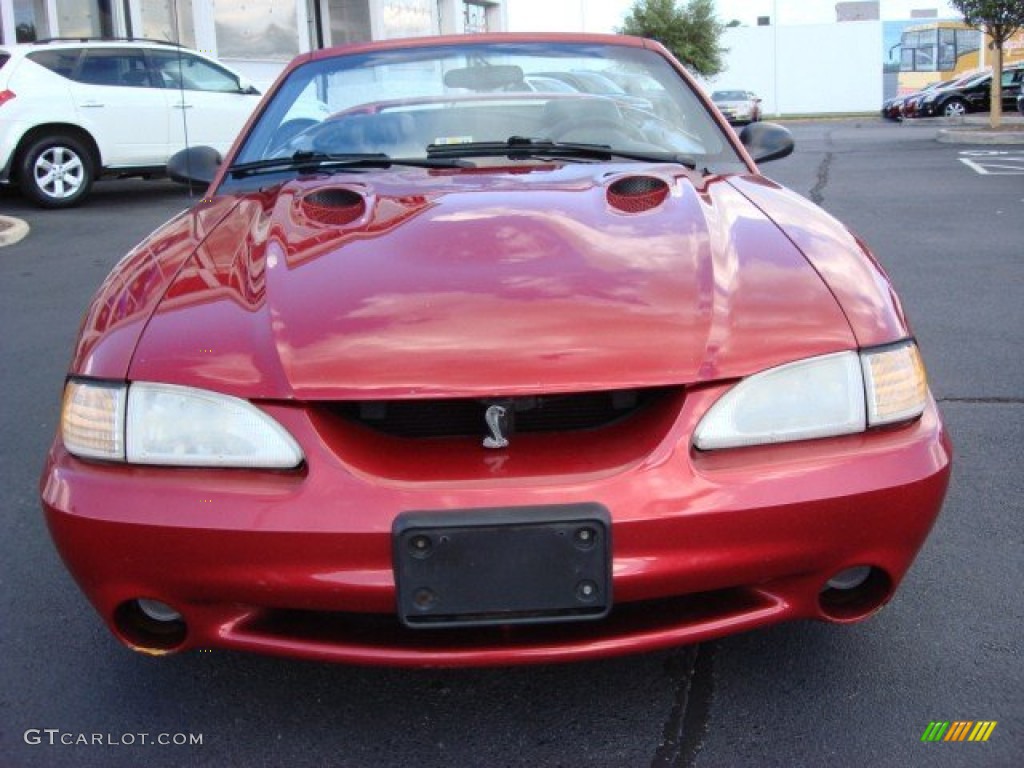 Laser Red 1998 Ford Mustang SVT Cobra Convertible Exterior Photo #55338566