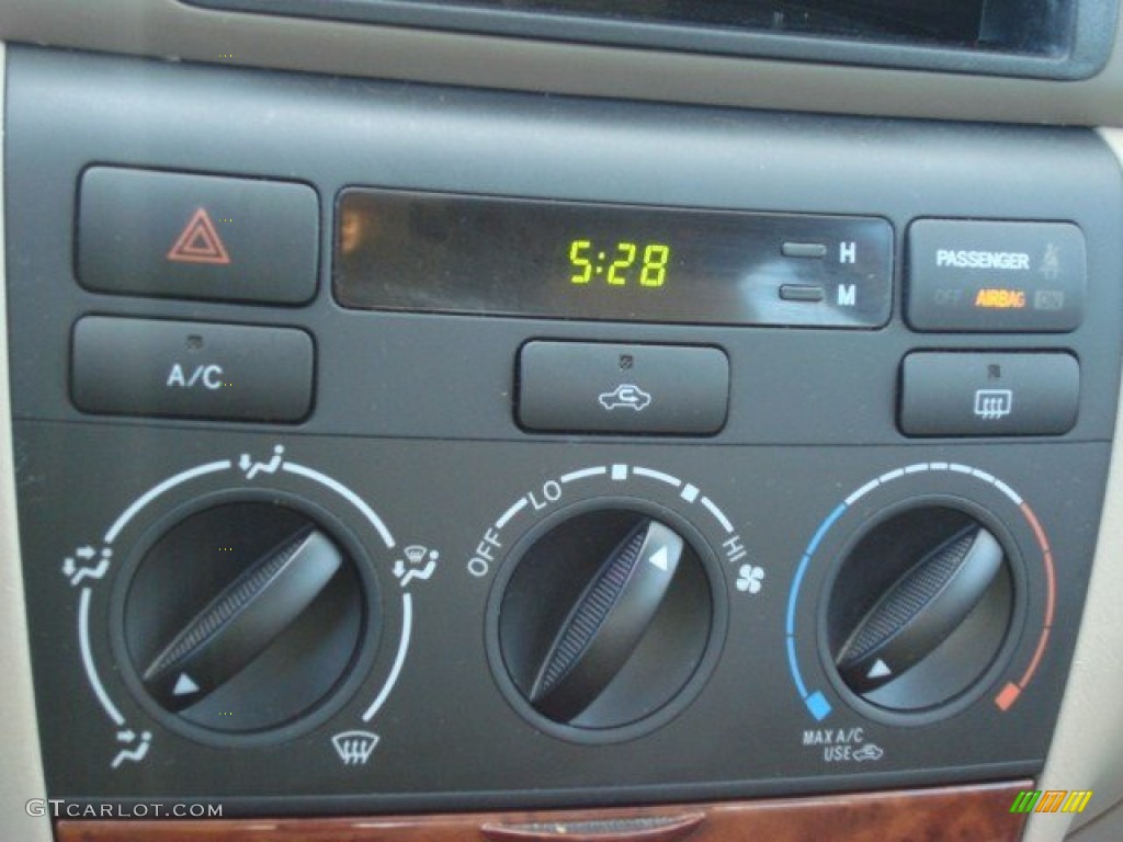 2006 Corolla LE - Impulse Red Pearl / Beige photo #15