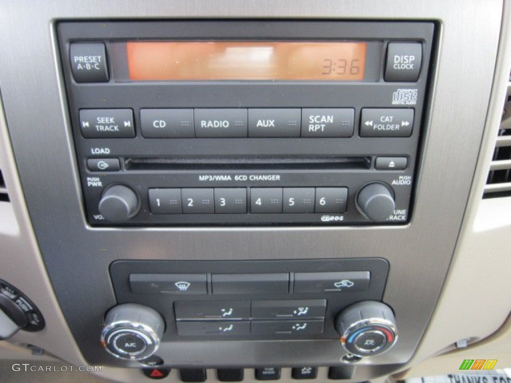 2012 Nissan Titan SV King Cab 4x4 Controls Photo #55358546