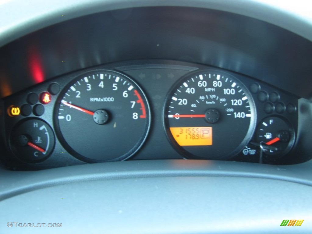 2009 Nissan Frontier SE King Cab Gauges Photo #55373159