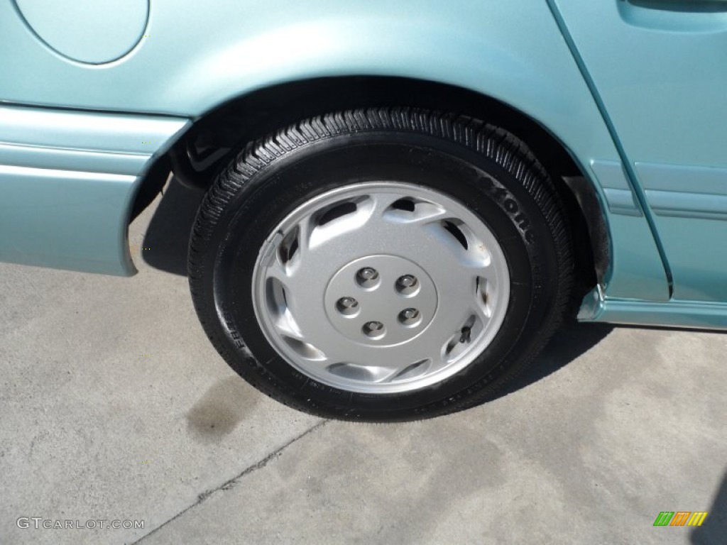 1995 Ford Taurus GL Sedan Wheel Photo #55393635