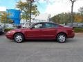 Ruby Red Metallic 2003 Oldsmobile Alero GX Sedan