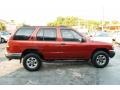 Red Pearl Metallic 1998 Nissan Pathfinder LE Exterior