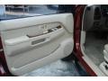 Blond 1998 Nissan Pathfinder LE Door Panel