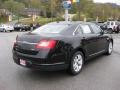 Ebony Black - Taurus SEL Photo No. 6