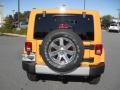 2012 Dozer Yellow Jeep Wrangler Unlimited Sahara 4x4  photo #3