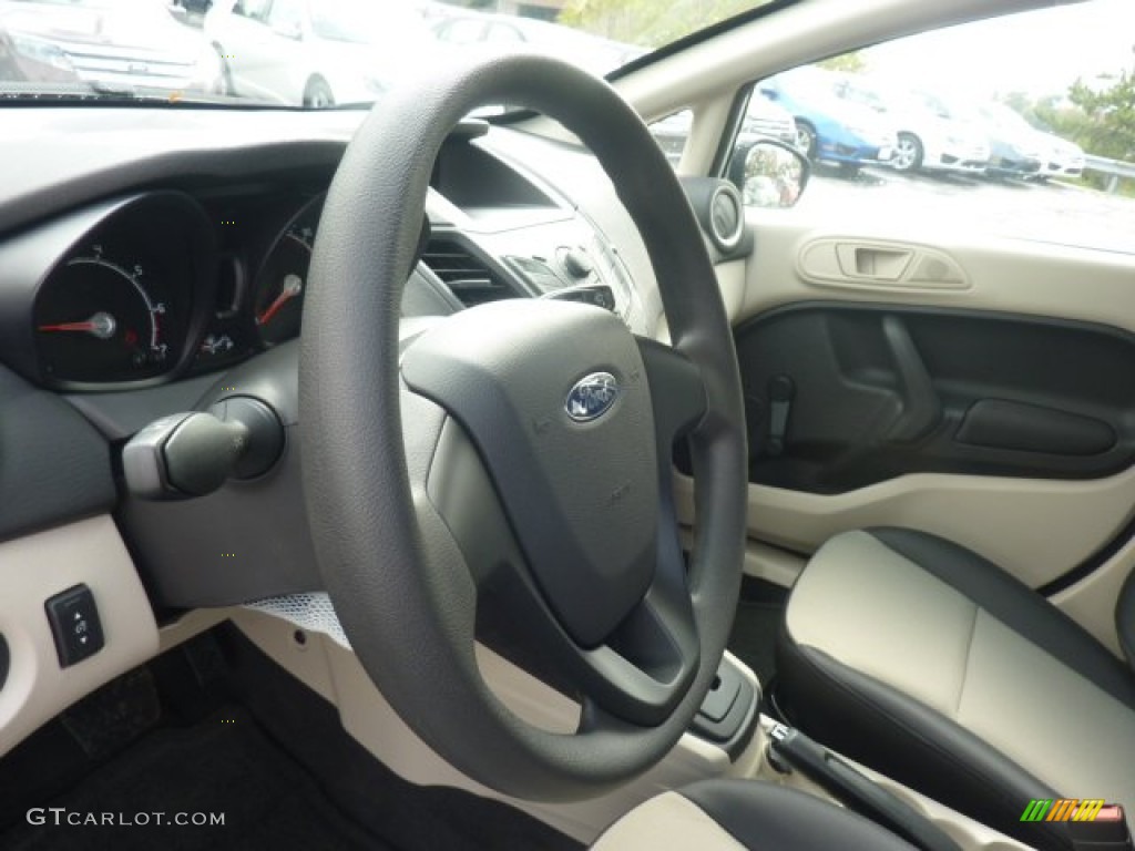 2012 Ford Fiesta S Sedan Light Stone/Charcoal Black Steering Wheel Photo #55538524