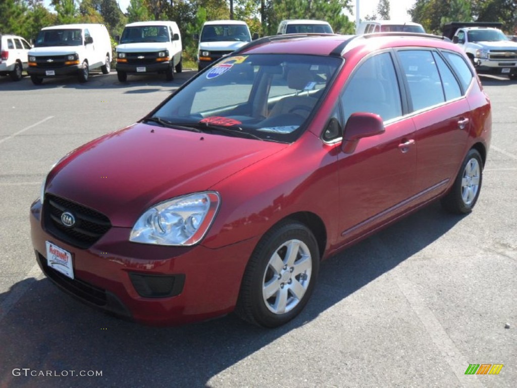 Volcanic Red Kia Rondo