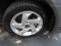 2004 Pontiac Vibe Standard Vibe Model Wheel and Tire Photo