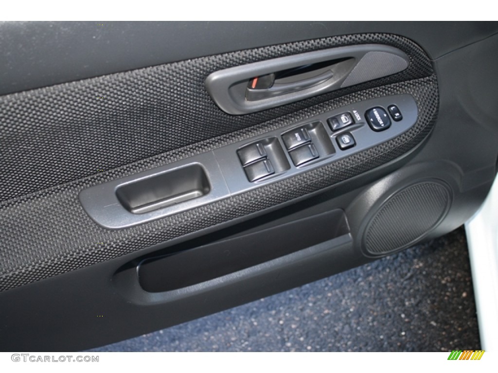 2005 Subaru Impreza 2.5 RS Sedan Black Door Panel Photo #55610858