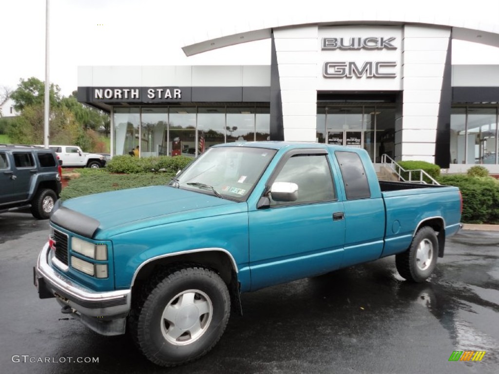 1994 Sierra 1500 SL Extended Cab 4x4 - Bright Teal Metallic / Beige photo #1
