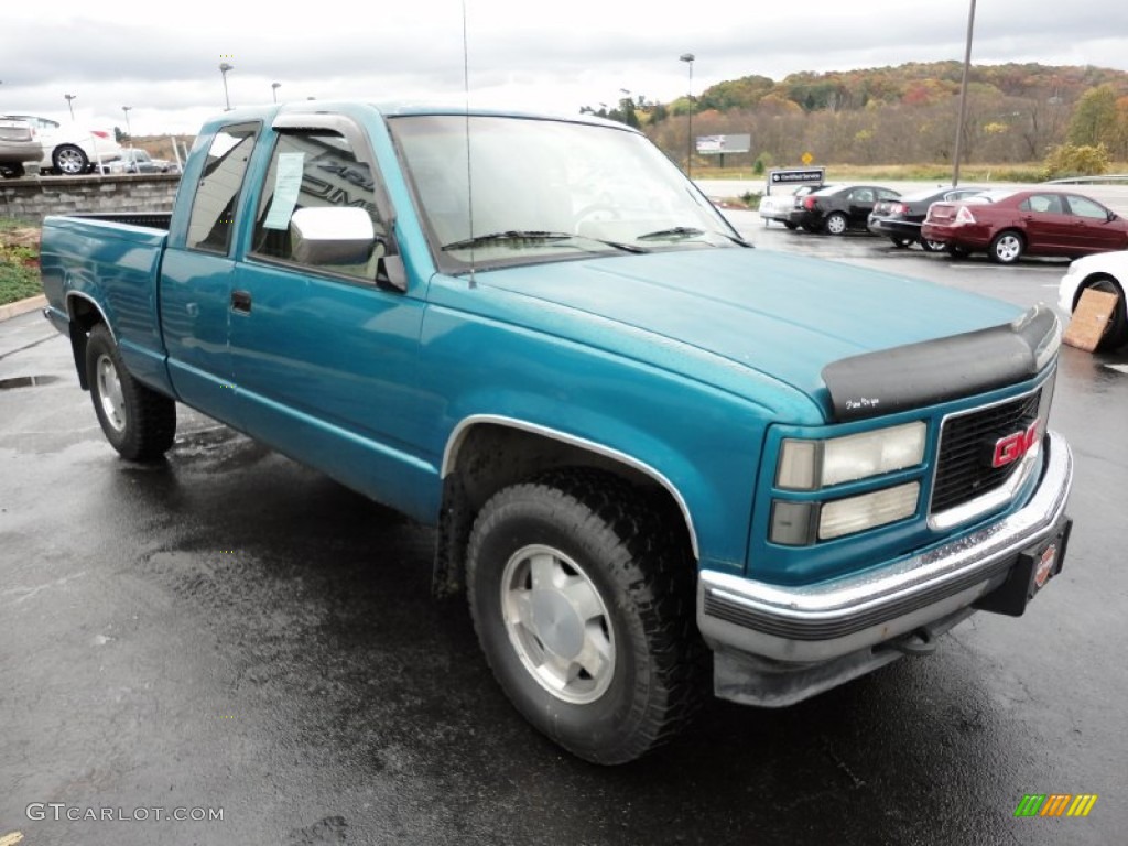 1994 Sierra 1500 SL Extended Cab 4x4 - Bright Teal Metallic / Beige photo #7