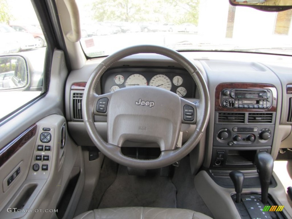 2004 Jeep Grand Cherokee Limited 4x4 Sandstone Dashboard Photo #55618908