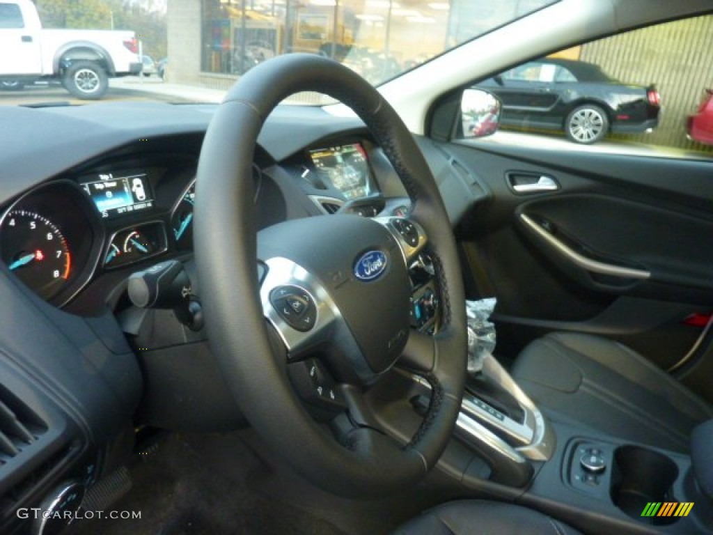 2012 Ford Focus SEL Sedan Charcoal Black Leather Steering Wheel Photo #55650470