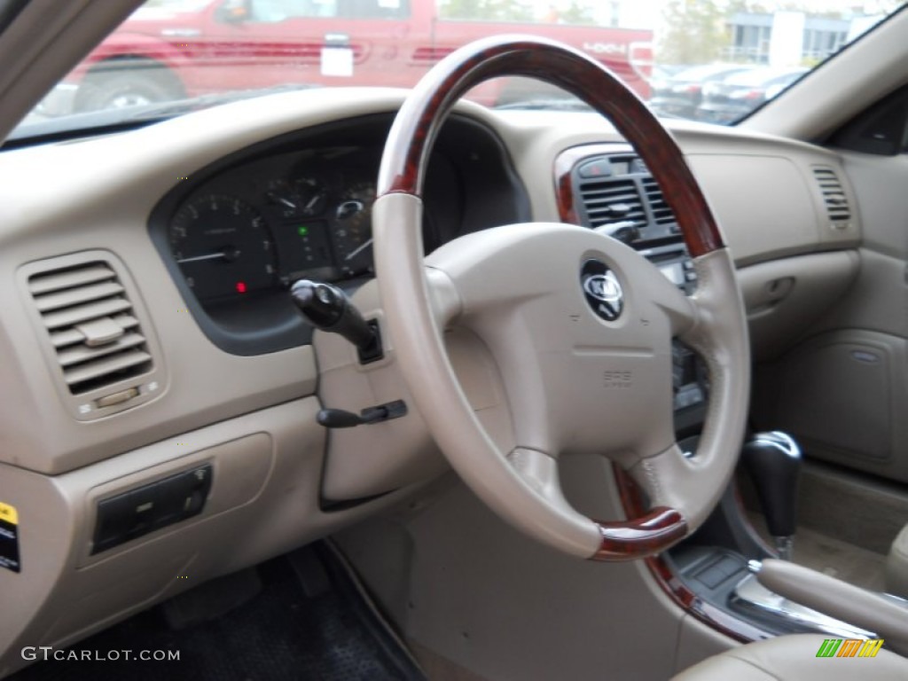 2004 Kia Optima EX V6 Beige Steering Wheel Photo #55655867