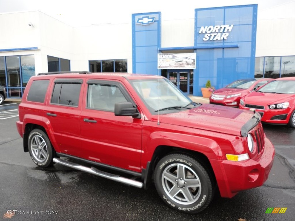 2009 Patriot Sport 4x4 - Inferno Red Crystal Pearl / Light Pebble Beige photo #1