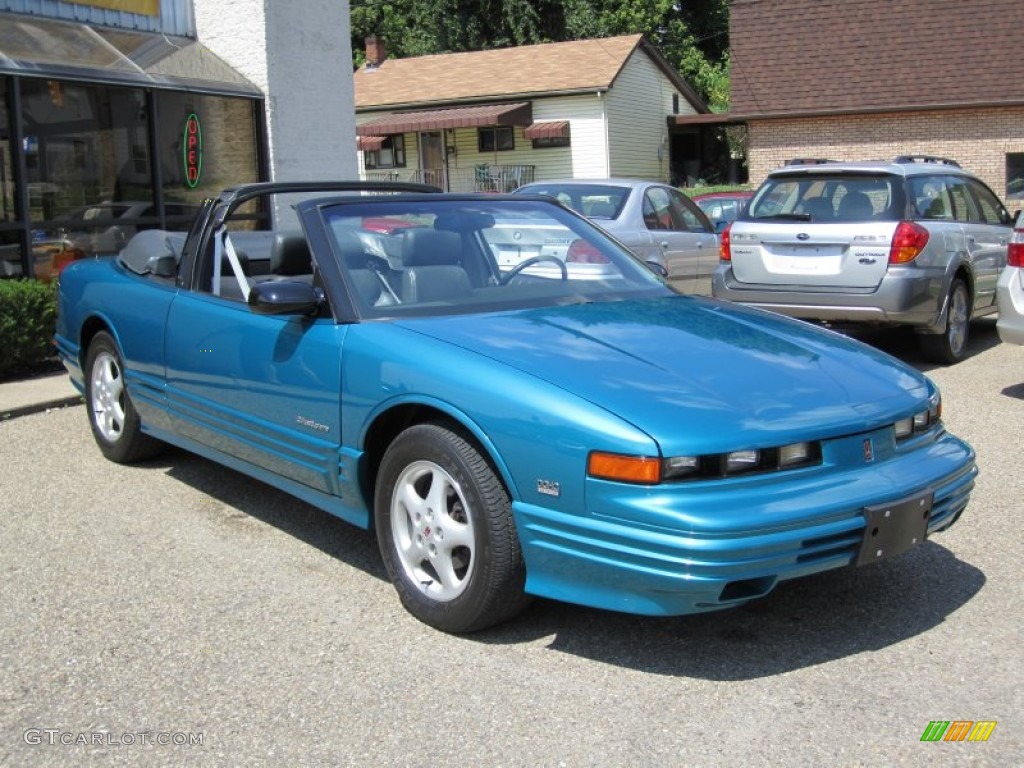 Bright Aqua Blue Metallic 1993 Oldsmobile Cutlass Supreme Convertible Exterior Photo #55670914