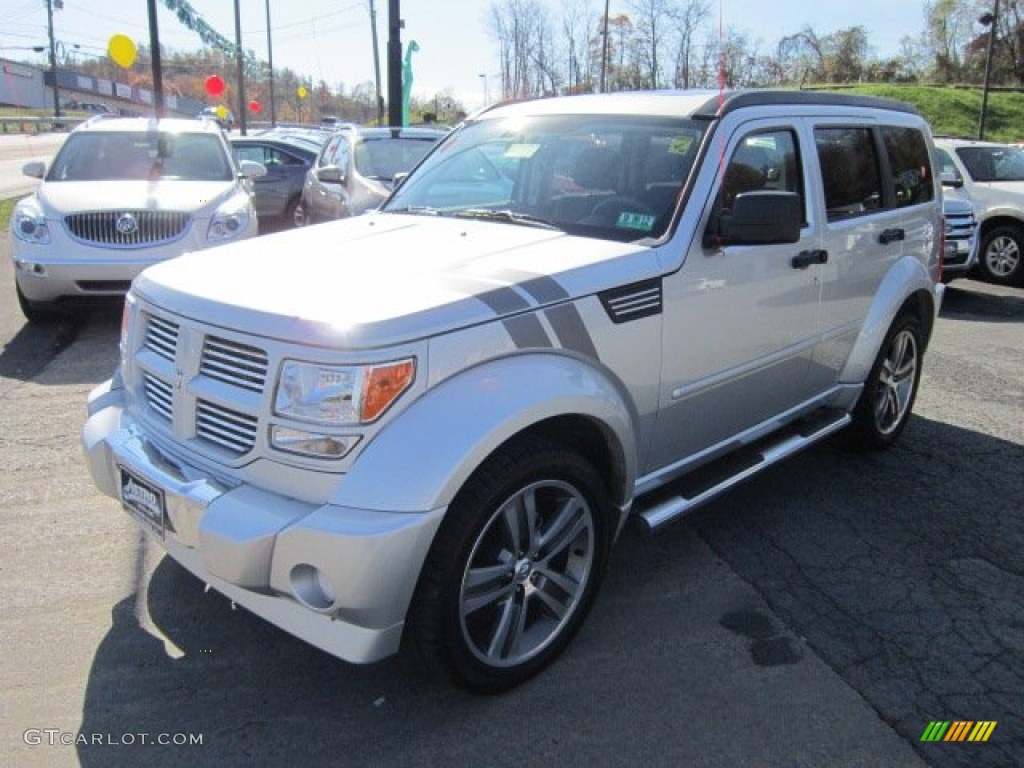 2011 Nitro Detonator 4x4 - Bright Silver Metallic / Dark Slate Gray/Red photo #3