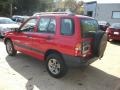 2004 Wildfire Red Chevrolet Tracker 4WD  photo #6