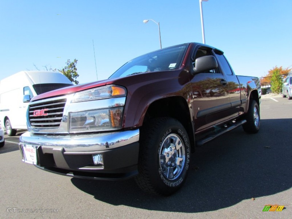 2007 Canyon SLE Extended Cab 4x4 - Sonoma Red Metallic / Dark Pewter photo #1