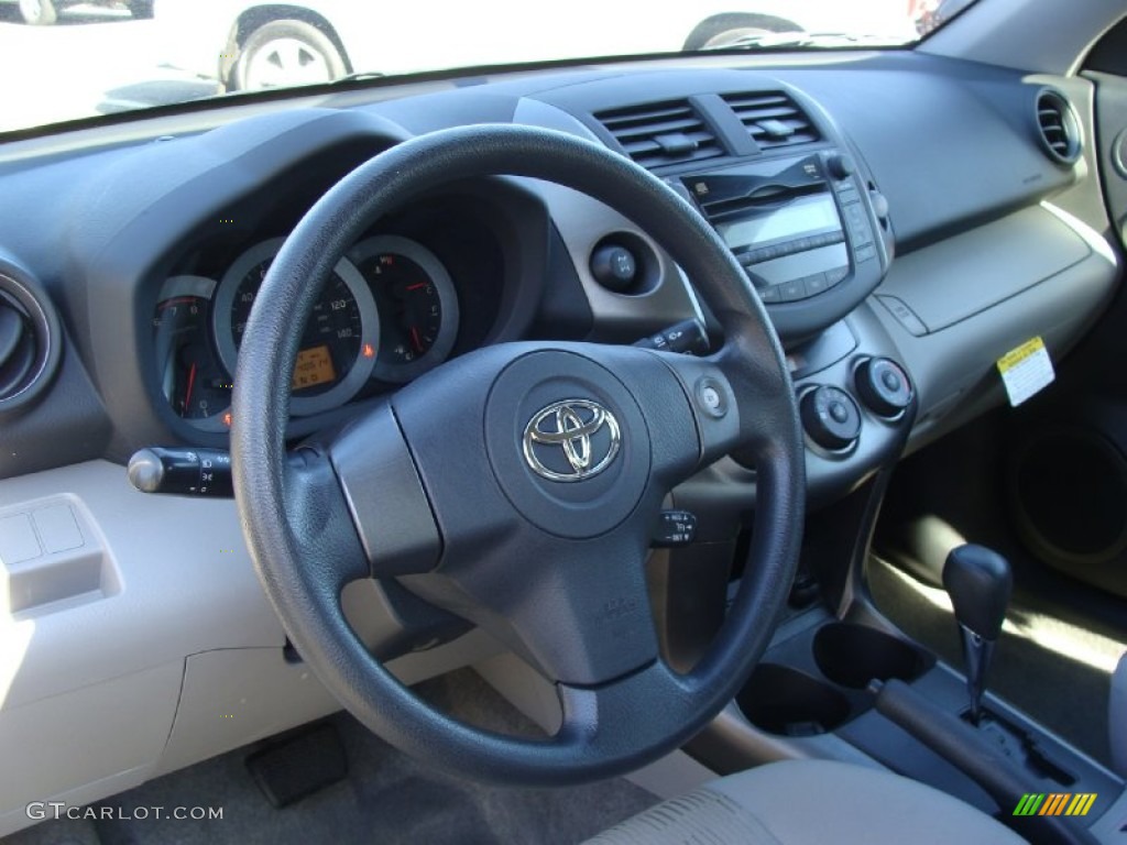 2009 Toyota Highlander Hybrid 4WD Sand Beige Steering Wheel Photo #55679213