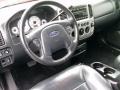 Ebony Black Steering Wheel Photo for 2003 Ford Escape #55680289