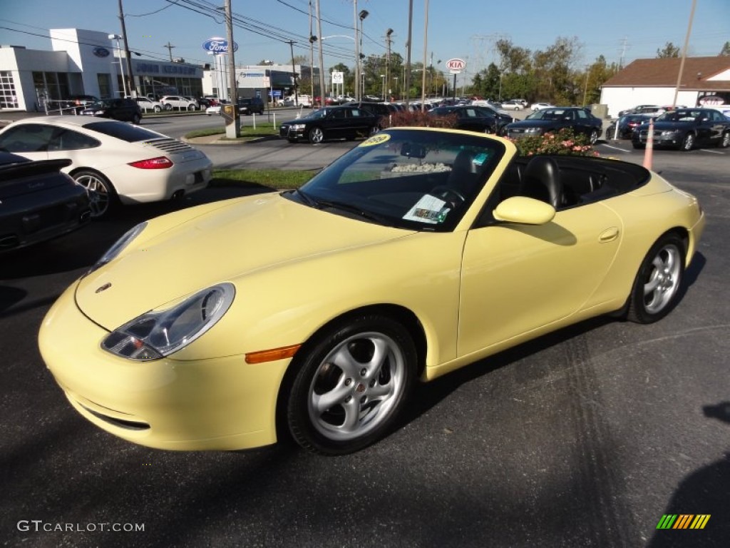 Pastel Yellow 1999 Porsche 911 Carrera Cabriolet Exterior Photo #55694659