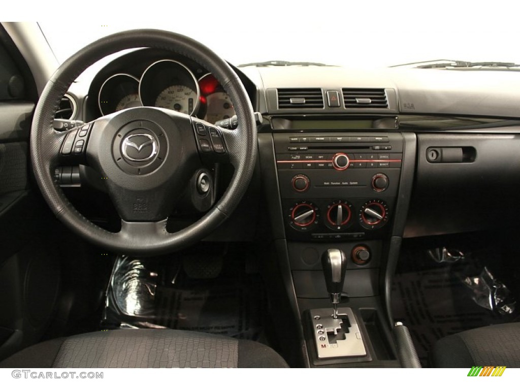2009 Mazda MAZDA3 i Touring Sedan Black Dashboard Photo #55701023