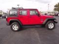 2009 Flame Red Jeep Wrangler Unlimited X 4x4  photo #4