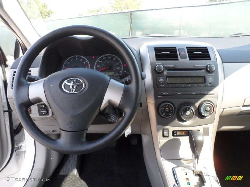 2011 Corolla LE - Super White / Ash photo #26