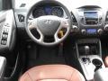 2011 Hyundai Tucson Black/Saddle Interior Dashboard Photo