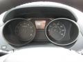 2011 Hyundai Tucson Black/Saddle Interior Gauges Photo