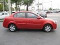 Tropical Red - Rio LX Sedan Photo No. 10