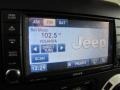 2012 Jeep Wrangler Unlimited Black with Polar White Accents/Orange Stitching Interior Controls Photo