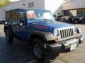 2010 Deep Water Blue Pearl Jeep Wrangler Unlimited Mountain Edition 4x4  photo #14