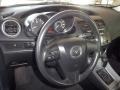 Black 2011 Mazda MAZDA3 i Sport 4 Door Steering Wheel